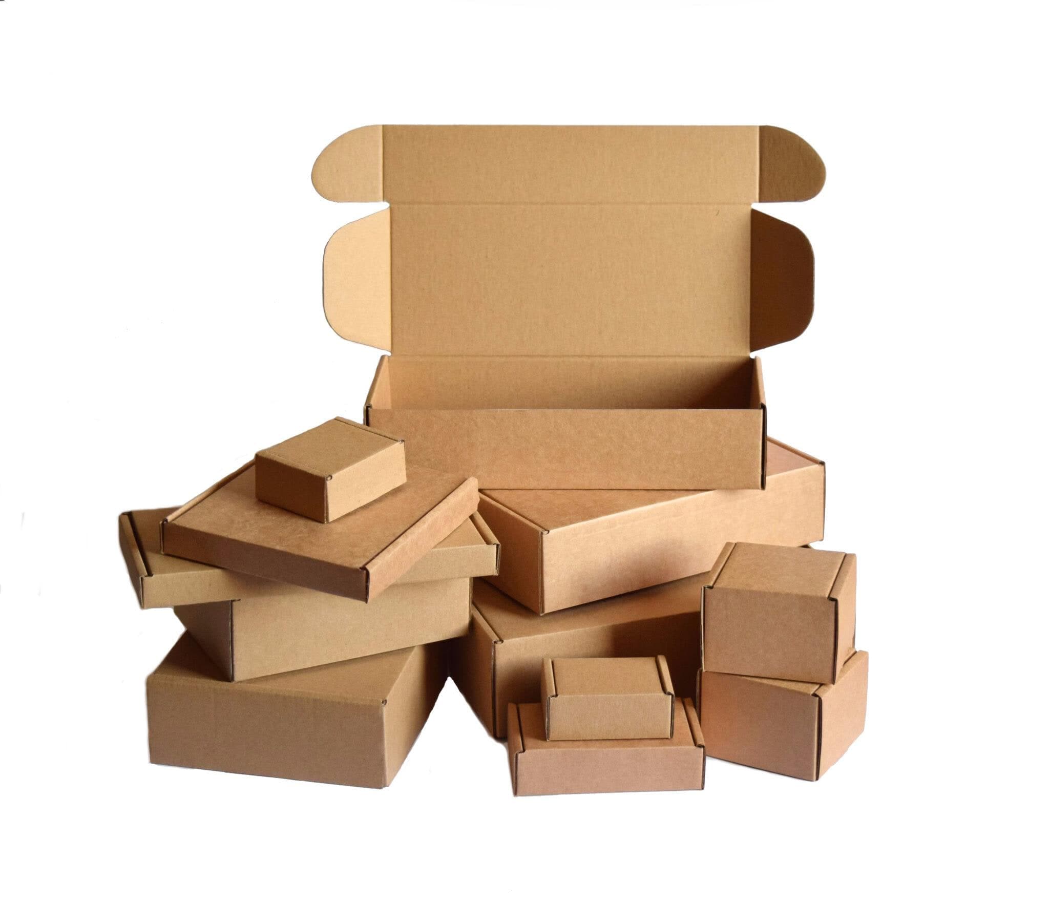 A stack of corrugated mailer boxes in a range of sizes on white, one open to show the folded lid and side walls.